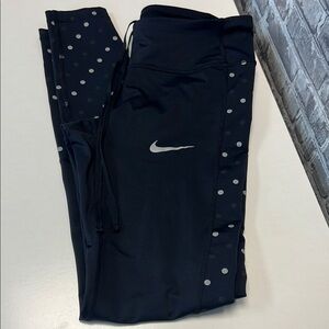 Woman's Nike Black and Silver Reflective Leggings‎